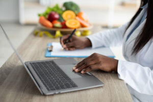 dietitian at laptop