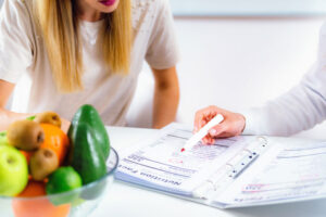 nutritionist explaining plan to patient