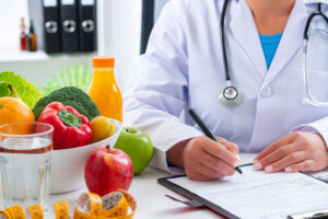 nutritionist writing prescription