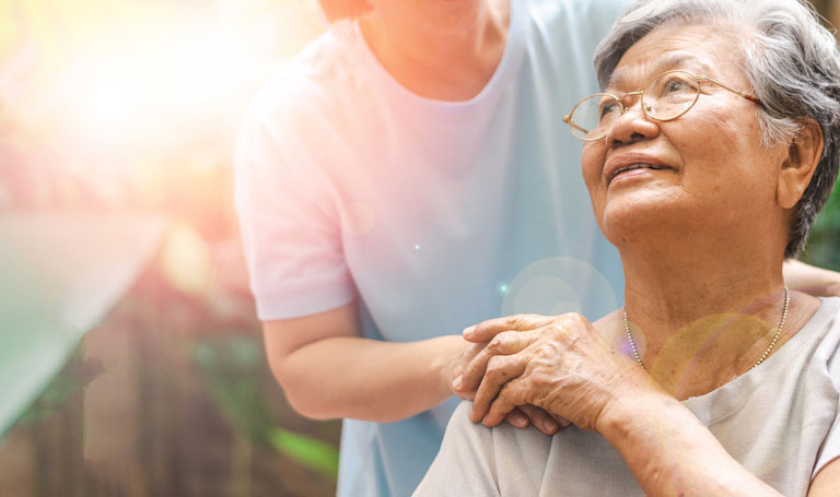 comforting an elderly woman