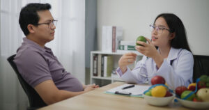 Nutritionist actively engaged in counseling a patient on GLP-1 options to aid in healthy weight loss.