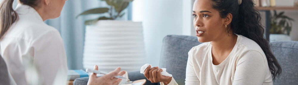 two women talking in therapist office
