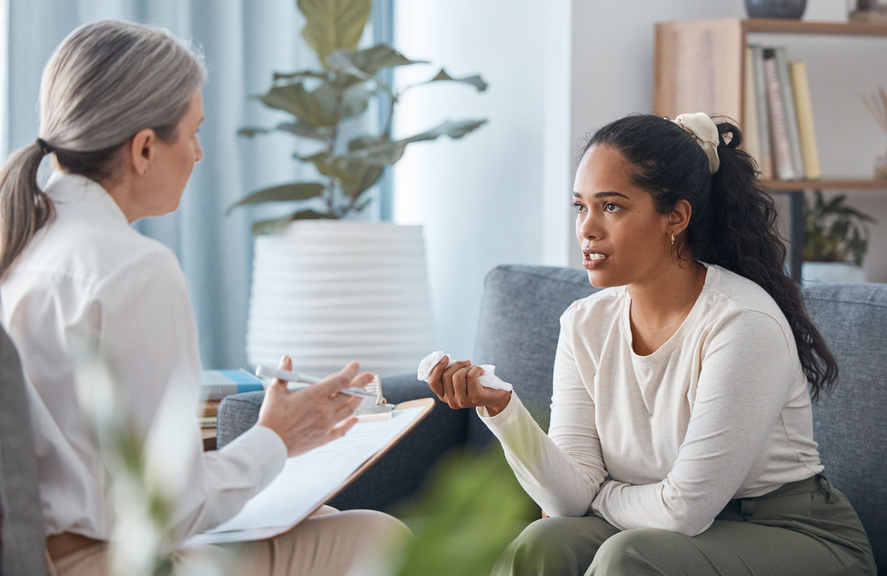 two women talking in therapist office